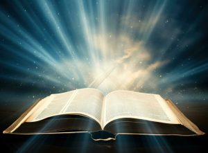Open Bible illuminated by sunlight – a reminder of eternal truth.